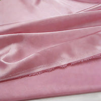 A close-up of Longan Craft Multicolor Satin Fabric By The Yard showcases its silky polyester satin texture with gentle folds and a slightly crinkled finish—perfect for apparel and textile projects.