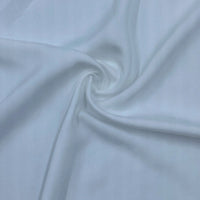 A close-up of Longan Craft’s Multicolor Satin Viscose Fabric by the yard, made from 100% viscose cellulose, with a soft, smooth texture and elegant folds—ideal for stylish evening gowns.