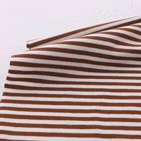 Longan Craft Multicolor Striped Cotton Jersey Fabric By The Yard, a stretch elastane sports jersey material, is shown neatly folded on a light surface.