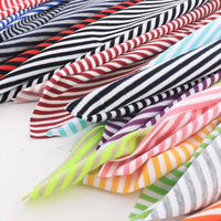 Longan Craft’s Multicolor Striped Cotton Jersey Fabric by the Yard features vivid overlapping stripes in red, black, blue, purple, yellow, pink, green, and gray—perfect stretch elastane jersey for sports or crafts.