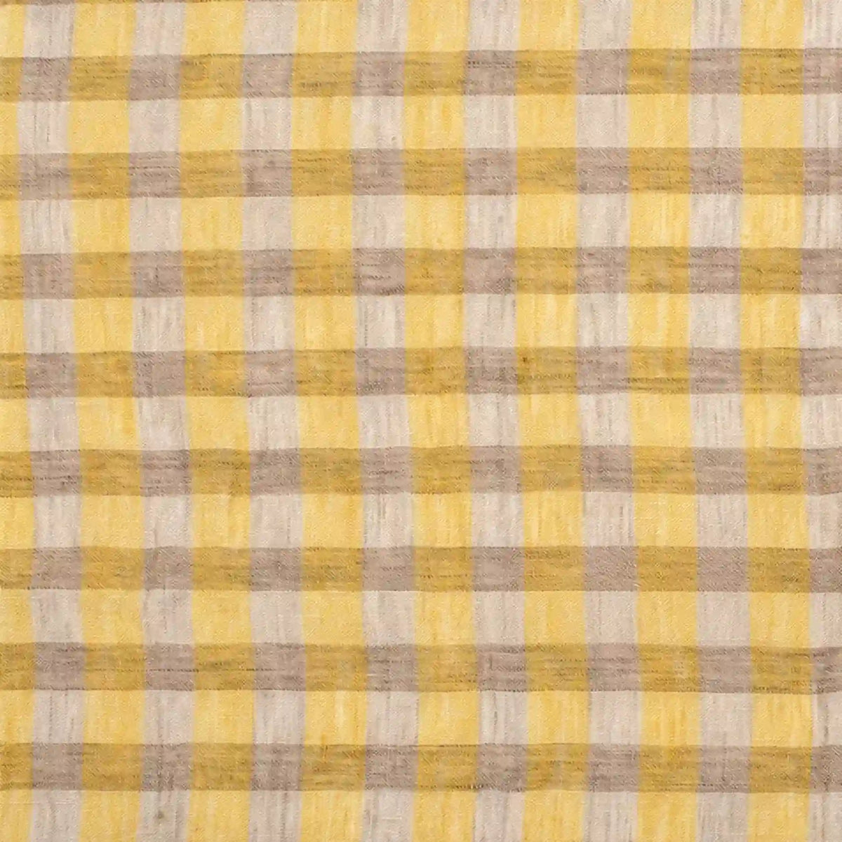 Longan Craft’s Multicolor Washed Plaid Linen Fabric By The Yard features a vintage checkered design with alternating yellow and beige hues. Crafted from pure, breathable linen, this fabric showcases intersecting horizontal and vertical lines for a warm, textured appearance—perfect for casual wear and creative projects.