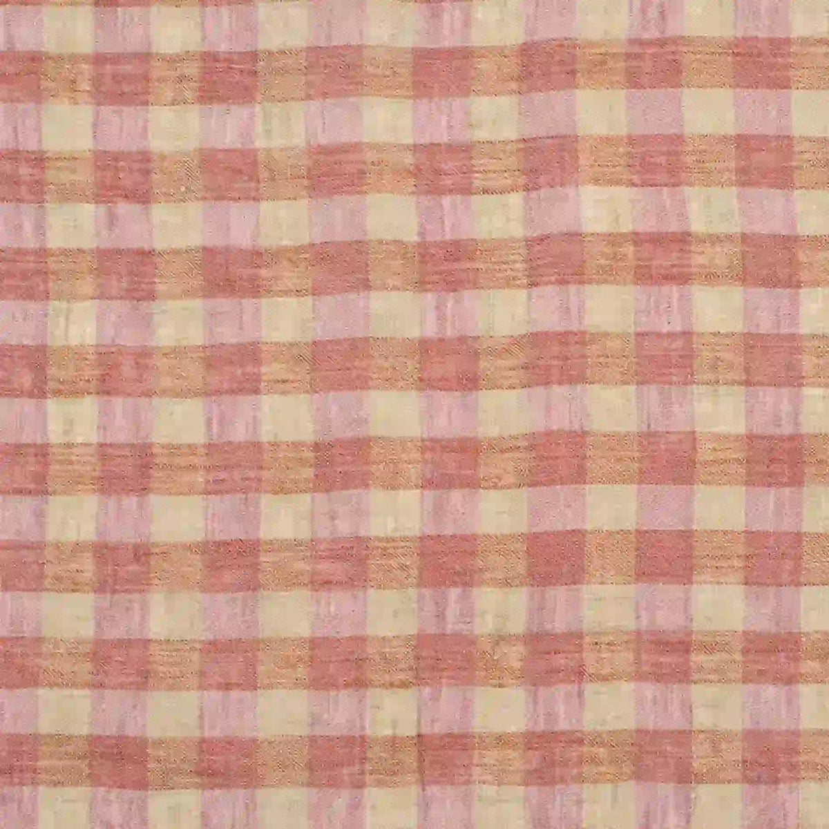 A close-up of the Multicolor Washed Plaid Linen Fabric by Longan Craft, featuring a vintage checkered pattern in pink and beige, with a grid of intersecting horizontal and vertical lines on pure breathable linen material—ideal for casual wear.