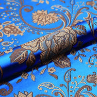 A close-up of Longan Craft’s Peony Jacquard Brocade Fabric by the yard, featuring colorful Chinese floral designs—ideal brocade material for formal dresses and elegant gowns.