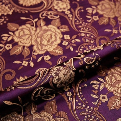 Close-up of Longan Craft's Peony Jacquard Brocade Fabric by the yard, a colorful Chinese floral brocade featuring vivid peonies and intricate gold patterns—perfect for formal dresses and luxurious projects.