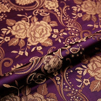 Close-up of Longan Craft's Peony Jacquard Brocade Fabric by the yard, a colorful Chinese floral brocade featuring vivid peonies and intricate gold patterns—perfect for formal dresses and luxurious projects.