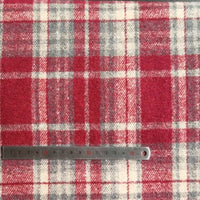 A red, white, and gray Plaid Brushed Mammoth Flannel Fabric by the yard from Longan Craft is shown with a metal ruler below, measuring 0–18 cm. This polyester cotton flannel is perfect for cozy fall projects.