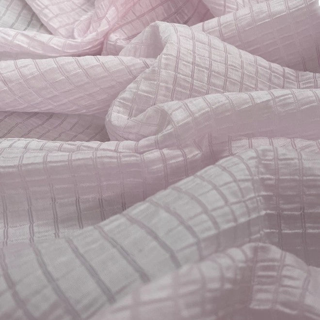 Longan Craft's Plaid Jacquard Lyocell Fabric By The Yard features a multicolor checked, breathable material perfect for elegant apparel projects—sustainable and soft with a delicate jacquard texture.