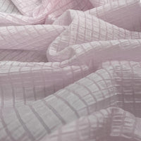 Longan Craft's Plaid Jacquard Lyocell Fabric By The Yard features a multicolor checked, breathable material perfect for elegant apparel projects—sustainable and soft with a delicate jacquard texture.