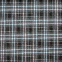 A close-up of Longan Craft's Plaid Mammoth Flannel Fabric by the yard shows intersecting black, grey, and white lines forming a plaid grid on comfy polyester-rayon shirting flannel material.