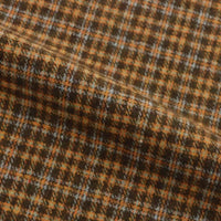 Folded Plaid Wool Fabric By The Yard in a heavyweight brushed finish, featuring a brown, orange, and light blue check pattern.