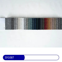 The Longan Craft swatch book displays 24 samples of "Plain Color Boucle Fabric By The Yard," featuring thick polyester boucle upholstery material in a color gradient, with a blue-and-white SY1087 label below.