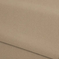 A close-up of the Plain Color French Terry Fabric By The Yard from Longan Craft shows its light brown, textured polyester material, neatly folded to reveal the weave and soft surface—ideal for winter clothing.