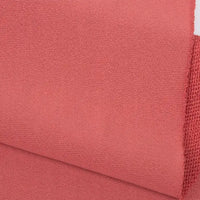 A close-up of Longan Craft’s Plain Color French Terry Fabric by the yard in dusty rose, highlighting the soft polyester material’s weave and neatly finished edges—ideal for winter clothing.