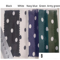 Five vertical swatches of Polka Dot Print Chiffon Fabric By The Yard in black, white, navy blue, green, and army green with white polka dots, shown next to a measuring ruler.