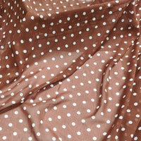 Polka Dot Print Chiffon Fabric By The Yard in sheer brown, draped in soft, elegant folds.