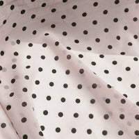 Light pink sheer Polka Dot Print Chiffon Fabric By The Yard featuring a black polka dot pattern.