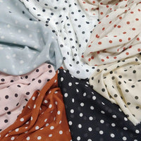 Polka Dot Print Chiffon Fabric By The Yard in various colors, including black, white, cream, blue, and pink.