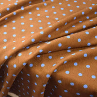 Brown stretch Polka Dot Printed 21 Wales Corduroy Fabric By The Yard featuring a light blue polka dot pattern.