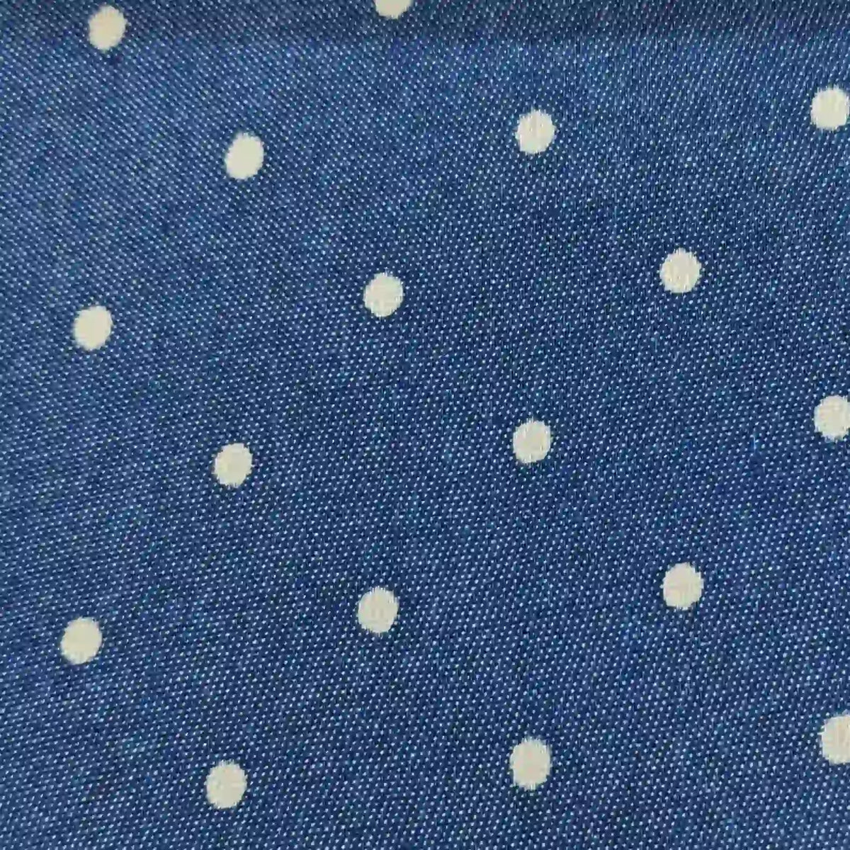 Polka Dot Printed Denim Fabric By The Yard in dark blue with a white polka dot print.