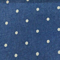 Polka Dot Printed Denim Fabric By The Yard in dark blue with a white polka dot print.