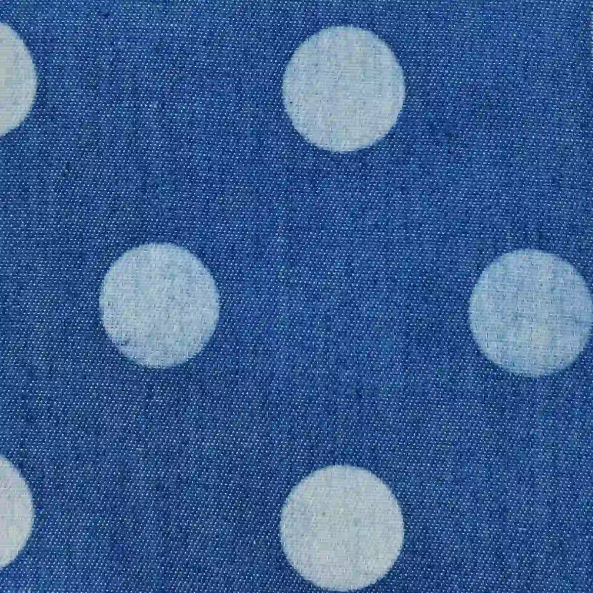 Polka Dot Printed Denim Fabric By The Yard in blue, featuring a pattern of large, white polka dots.