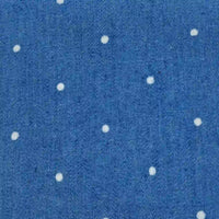 Polka Dot Printed Denim Fabric By The Yard in blue with a pattern of small white polka dots.