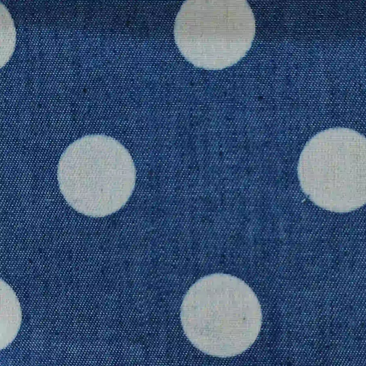 Polka Dot Printed Denim Fabric By The Yard in blue cotton polyester with a white polka dot print.