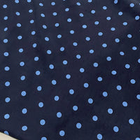 Polka Dot Printed Faux Suede Fabric By The Yard in dark blue with light blue polka dots.