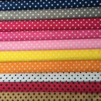 Polka Dot Printed Peachskin Fabric by Longan Craft: colorful microfiber polyester fabric with white or black polka dots in blue, gray, red, pink, yellow, orange, white, and brown. Soft peachskin texture—perfect for DIY skirts and dressmaking projects.