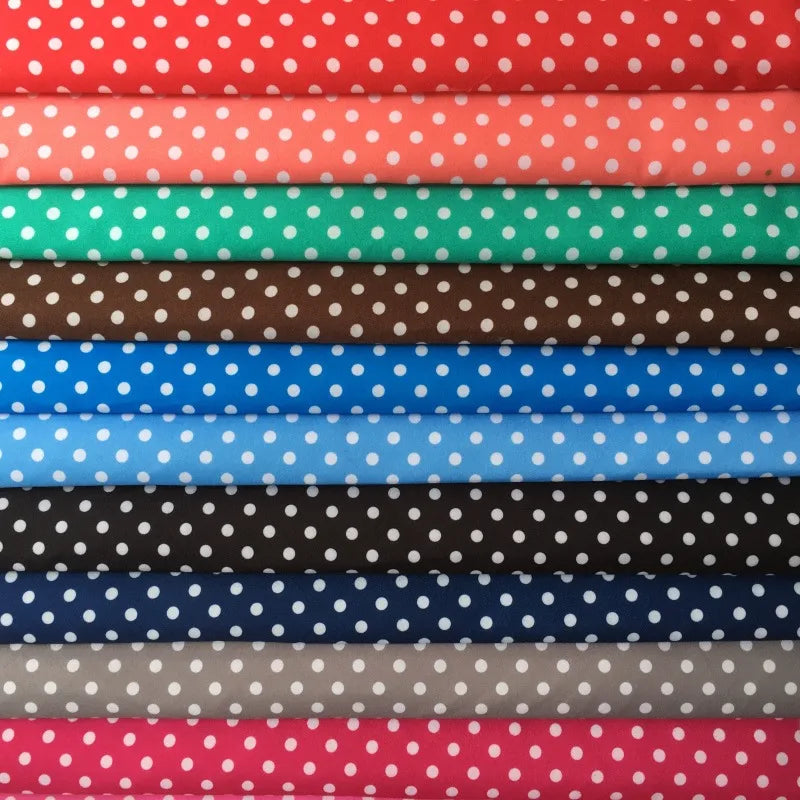 A stack of Longan Craft Polka Dot Printed Peachskin Fabric By The Yard, in red, pink, green, brown, blue, black, and gray with white dots. This colorful microfiber polyester material is soft and perfect for DIY skirts.