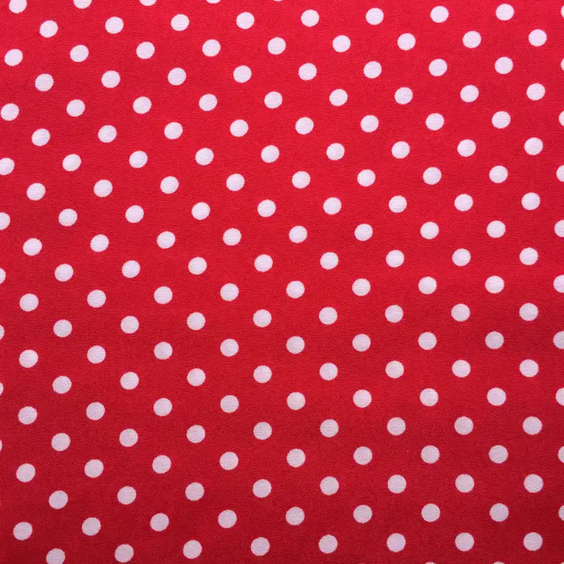 Longan Craft's Polka Dot Printed Peachskin Fabric features a red background with evenly spaced white polka dots, made from soft microfiber polyester—ideal for DIY skirts or playful dressmaking projects.