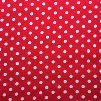 Longan Craft's Polka Dot Printed Peachskin Fabric features a red background with evenly spaced white polka dots, made from soft microfiber polyester—ideal for DIY skirts or playful dressmaking projects.