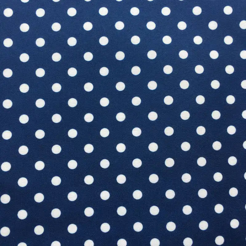 Longan Craft's Polka Dot Printed Peachskin Fabric By The Yard features a navy blue background with evenly spaced white dots, made from colorful microfiber polyester with a soft texture—perfect for creating stylish DIY skirts and garments.