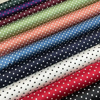 Longan Craft’s Polka Dot Stretch Silk Fabric By The Yard features white polka dots on green, pink, blue, red, black, and white 19 momme spandex silk—perfect for vintage clothing or elegant evening and bridal wear.