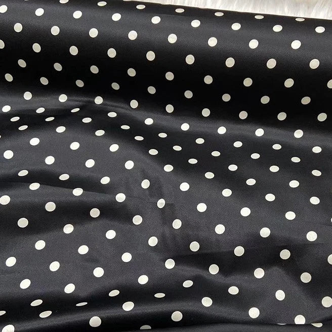Longan Craft’s Polka Dot Stretch Silk Fabric by the yard features smooth 19 momme spandex silk printed with evenly spaced white dots—perfect for vintage clothing, evening gowns, or bridal wear.