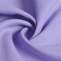 Close-up of Longan Craft Polyester Gabardine Fabric By The Yard, showing its smooth, soft texture and twill weave. This premium plain color gabardine is ideal for stylish jackets and features a gentle sheen and wrinkle resistance.