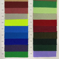 A fabric chart from Longan Craft shows rows of Polyester Gabardine Fabric By The Yard samples, numbered 57–78, in reds, greens, blues, purples, yellow, and grey. This premium twill gabardine is ideal for stylish jackets.