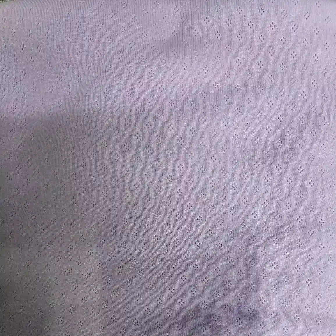 Longan Craft Pure Cotton Pointelle Knit Jersey Fabric by the yard features a subtle dotted cross pattern on smooth 100% cotton, making this lightweight jacquard pointelle fabric perfect for DIY baby bodysuits and infant clothing.