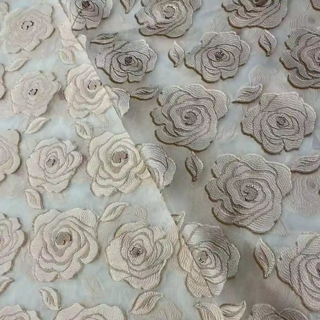 The Rose Jacquard Organza Fabric by Longan Craft features multicolor flower designs on sheer organza, with vintage-inspired motifs perfect for elegant skirts and sophisticated projects. Available by the yard.