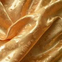 Close-up of Longan Craft Rose Jacquard Satin Fabric By The Yard, a colorful polyester floral jacquard ideal for costumes. Features roses and leaves in a lustrous satin material with soft folds that gently reflect light.