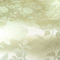 Close-up of Longan Craft's Rose Jacquard Satin Fabric By The Yard, a colorful polyester jacquard with intricate woven roses and leaves, ideal for costumes and decorative projects.
