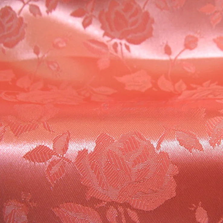 Close-up of Longan Craft's Rose Jacquard Satin Fabric by the Yard—a colorful polyester floral satin material with an embossed rose pattern, smooth texture, and soft folds that reflect light; perfect for costumes.
