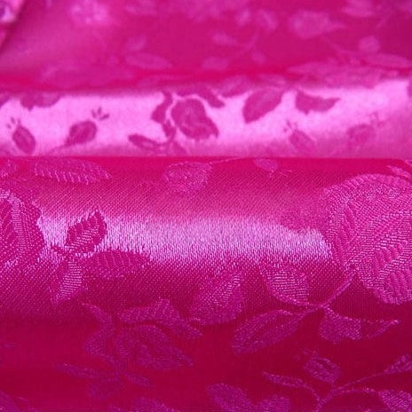 Close-up of Rose Jacquard Satin Fabric by Longan Craft, a colorful polyester floral jacquard satin with an embossed leaf and flower pattern, perfect for costumes and sold by the yard.