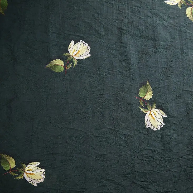 Longan Craft’s Rose Printed Lyocell Fabric By The Yard features a botanical rose pattern with green leaves on breathable, sustainable lyocell—perfect for stylish and eco-friendly dressmaking or creative projects.
