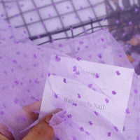 Sheer Swiss Dot Organza Fabric By The Yard in purple, featuring raised, colorful 3D dots.
