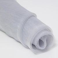A close-up of Longan Craft’s Silky Polyester Organza Fabric By The Yard shows its soft, sheer, glossy texture in white—ideal for bridal and evening wear. Premium solid color material with elegant folds is perfect for dresses and decorations.