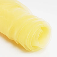 A close-up of Longan Craft's Silky Polyester Organza Fabric By The Yard—premium, soft, and sheer solid color organza material—coiled on white; perfect for evening dresses or bridal gowns.