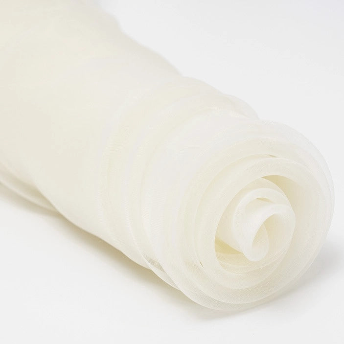 A close-up of Longan Craft's Silky Polyester Organza Fabric By The Yard, a premium solid color, soft and sheer bridal organza material, rolled and displayed on a white background.