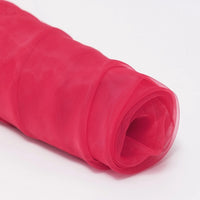 A close-up of Longan Craft’s Silky Polyester Organza Fabric By The Yard in bright pink, a premium solid color organza that’s sheer, lightweight, and perfect for elegant evening dresses and bridal gowns.