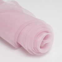A close-up of Longan Craft Silky Polyester Organza Fabric by the yard in light pink, a premium soft and sheer solid color perfect for evening dresses or bridal gowns, displayed on a white background.